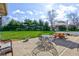 Outdoor patio featuring an iron table set, picnic table, seating and well manicured lawn at 9377 N 500 W, McCordsville, IN 46055