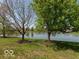 Backyard view of a relaxing pond behind the house at 1108 Nanwich Ct, Indianapolis, IN 46217