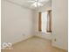 Bedroom featuring a fan, a window and neutral carpeting at 1108 Nanwich Ct, Indianapolis, IN 46217