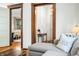 Stylish living room with hardwood floors, a comfy couch, and inviting views into other rooms, for modern living at 1114 Pennsylvania St, Columbus, IN 47201
