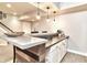 Finished basement wet bar featuring custom counter, wooden accents, and recessed lighting at 11233 Rockingham Cir, Fishers, IN 46037