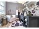 Cozy home office featuring a large desk, comfortable chair, and stylish decor at 11233 Rockingham Cir, Fishers, IN 46037