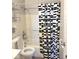 Bathroom with a shower and a black and white stripped curtain at 1205 N Gibson Ave, Indianapolis, IN 46219
