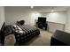 Modern bedroom featuring plaid bedding, a spacious work area, and neutral décor at 1221 Malbec Cir, Westfield, IN 46074