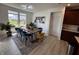 Bright dining room with large windows, stylish furniture, and modern decor at 1221 Malbec Cir, Westfield, IN 46074