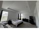 Bright main bedroom with large windows, comfortable seating area, and ample space at 1221 Malbec Cir, Westfield, IN 46074