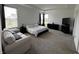 Large main bedroom features neutral colors, large windows, and plenty of space for relaxation at 1221 Malbec Cir, Westfield, IN 46074