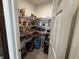 Walk-in pantry featuring ample shelving and storage for food and household items at 1221 Malbec Cir, Westfield, IN 46074