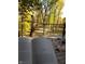 Open book shows a backyard view with fall trees at 13 Ridgeline Dr, Brownsburg, IN 46112