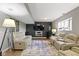 Finished basement offers comfortable seating and media center for entertaining guests at 13 Ridgeline Dr, Brownsburg, IN 46112