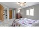 Relaxing bedroom featuring carpet, neutral paint, a ceiling fan, and a window showcasing the outdoors at 13 Ridgeline Dr, Brownsburg, IN 46112