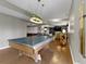 Entertainment space with a pool table, built-in bar, and media area for relaxing and socializing at 13 Ridgeline Dr, Brownsburg, IN 46112