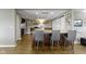 Kitchenette with stainless appliances, stone accent wall, and island with bar seating at 13 Ridgeline Dr, Brownsburg, IN 46112