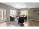 Comfortable living space with natural light from large windows and cozy seating arrangement at 13 Ridgeline Dr, Brownsburg, IN 46112