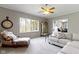 Bright living room with large windows, comfortable seating, and views of the outdoors at 13 Ridgeline Dr, Brownsburg, IN 46112