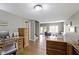 Spacious home office with hardwood floors and natural light, adjacent to the living room at 13 Ridgeline Dr, Brownsburg, IN 46112