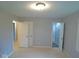 Spacious bedroom with neutral walls and carpet, brightened with natural light at 1314 Brookside S Dr, Columbus, IN 47201