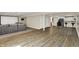 Finished basement with bar area, theatre, and wood flooring at 13728 Oliver Ln, Carmel, IN 46074