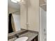 Bathroom featuring vanity with granite countertop and shower with glass door at 13728 Oliver Ln, Carmel, IN 46074