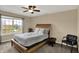 Bedroom with carpet and neutral walls plus bright windows and decorative pillows at 13728 Oliver Ln, Carmel, IN 46074