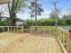 New wooden deck and backyard with a wood fence and green space provide a serene outdoor retreat at 1401 E 24Th St, Muncie, IN 47302