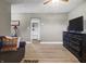 Living room featuring hardwood floors, lighting, and decor at 1401 E 24Th St, Muncie, IN 47302