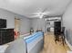 Bright living room featuring hardwood floors and a view to the kitchen at 1401 E 24Th St, Muncie, IN 47302