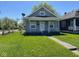 Charming single-Gathering home with a cozy front porch and a well-maintained, fenced yard at 1401 W 34Th St, Indianapolis, IN 46208