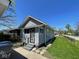 Charming home featuring gray siding, a small front porch, and a well-maintained lawn at 1401 W 34Th St, Indianapolis, IN 46208