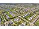 A planned community with manicured lawns and lakes offers an idyllic suburban landscape at 15329 Smithfield Dr, Westfield, IN 46074