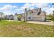 The home features an expansive backyard with lush green grass at 15329 Smithfield Dr, Westfield, IN 46074