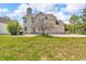 The house features a grill and access to the backyard from the rear at 15329 Smithfield Dr, Westfield, IN 46074