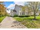 Charming two-story home with a well-manicured lawn and a long private driveway at 15329 Smithfield Dr, Westfield, IN 46074