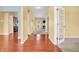 Inviting foyer showcasing hardwood floors, neutral paint, and an open layout connecting to other rooms at 15329 Smithfield Dr, Westfield, IN 46074