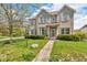 Charming two-story home featuring a brick facade, well-maintained lawn, and inviting curb appeal at 15329 Smithfield Dr, Westfield, IN 46074