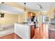 Well-equipped kitchen with granite countertops, mosaic backsplash, and stainless steel appliances at 15329 Smithfield Dr, Westfield, IN 46074