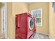 Laundry room featuring updated washer and dryer units and a window at 15329 Smithfield Dr, Westfield, IN 46074