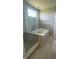 Modern bathroom with a glass-enclosed shower and a built-in soaking tub at 15406 Forest Glade Dr, Fishers, IN 46037