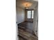 Bright bedroom featuring vinyl flooring and windows with natural light at 15406 Forest Glade Dr, Fishers, IN 46037