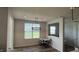 Bright dining area with modern lighting fixture and view to the exterior at 15406 Forest Glade Dr, Fishers, IN 46037