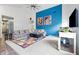 Spacious living room with modern decor, plush carpeting, a large sectional and lots of light at 1666 Huntzinger Blvd, Pendleton, IN 46064