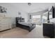 Comfortable bedroom featuring neutral walls, soft carpeting, and plenty of natural light at 1666 Huntzinger Blvd, Pendleton, IN 46064