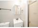 Bathroom featuring white vanity, mirror, and a walk-in shower at 1823 E 44Th St, Anderson, IN 46013
