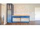 Kitchen island with white shelving and storage; blue cabinets and butcher block countertops at 1823 E 44Th St, Anderson, IN 46013