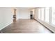 Inviting living room with wood floors, lots of natural light, and a serene atmosphere at 1823 E 44Th St, Anderson, IN 46013