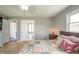 Main bedroom featuring hardwood floors, overhead ceiling fan, and closet at 1823 E 44Th St, Anderson, IN 46013