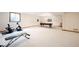 Finished basement featuring neutral carpeting and ample space for recreation and exercise at 1893 Water Oak Way, Avon, IN 46123