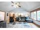 Bright and airy living room with hardwood floors flows into the kitchen and dining areas at 1893 Water Oak Way, Avon, IN 46123