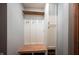 Mud room featuring bench with storage, hooks, and cabinets for easy organization at 1893 Water Oak Way, Avon, IN 46123