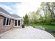 Backyard patio area with a grill and dining table, perfect for outdoor entertaining at 1893 Water Oak Way, Avon, IN 46123